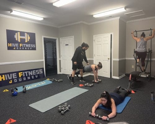 Members working out together at Hive Fitness Journey in Woodstock, GA