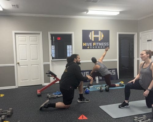 Strength training floor at Hive Fitness Journey gym in Woodstock, GA